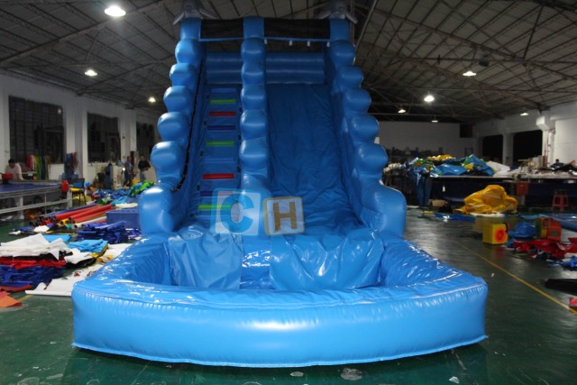 Inflatable swimming pool and slide