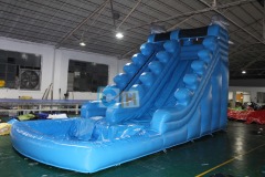 Inflatable swimming pool and slide