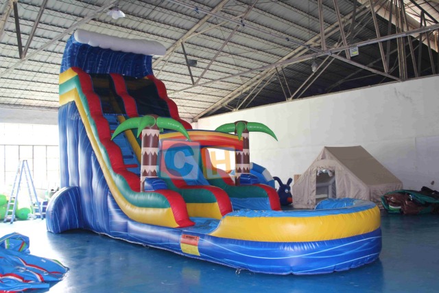 Inflatable swimming pool and slide