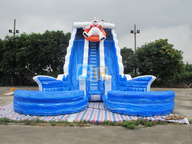 Inflatable bounce house with water slide