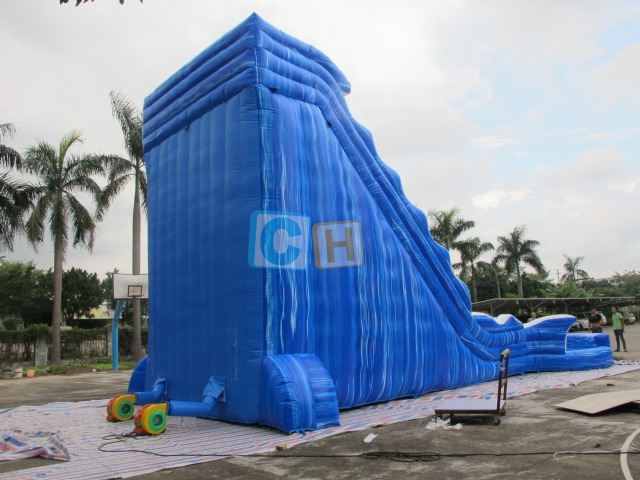 Inflatable bounce house with water slide