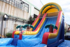 Inflatable bounce house and water slide