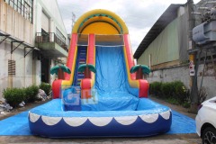 Inflatable bounce house and water slide