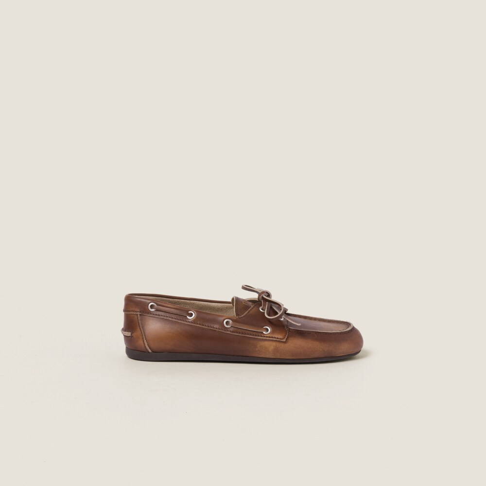 Unlined bleached leather boat shoes