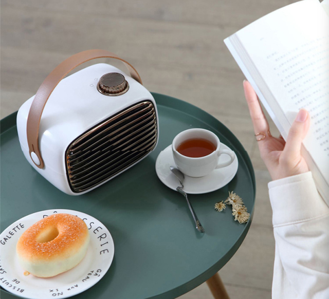 Home mini solar heater portable silent heater office desktop small constant temperature hot air blower,Ningbo YoungHome Houseware Co., Ltd.,Home mini sun portable silent constant temperature hot air blower