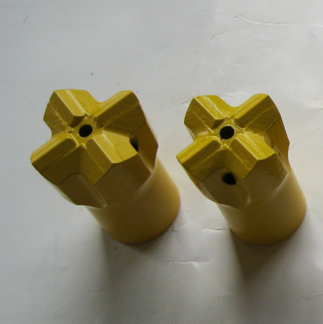 Tapered cross bits