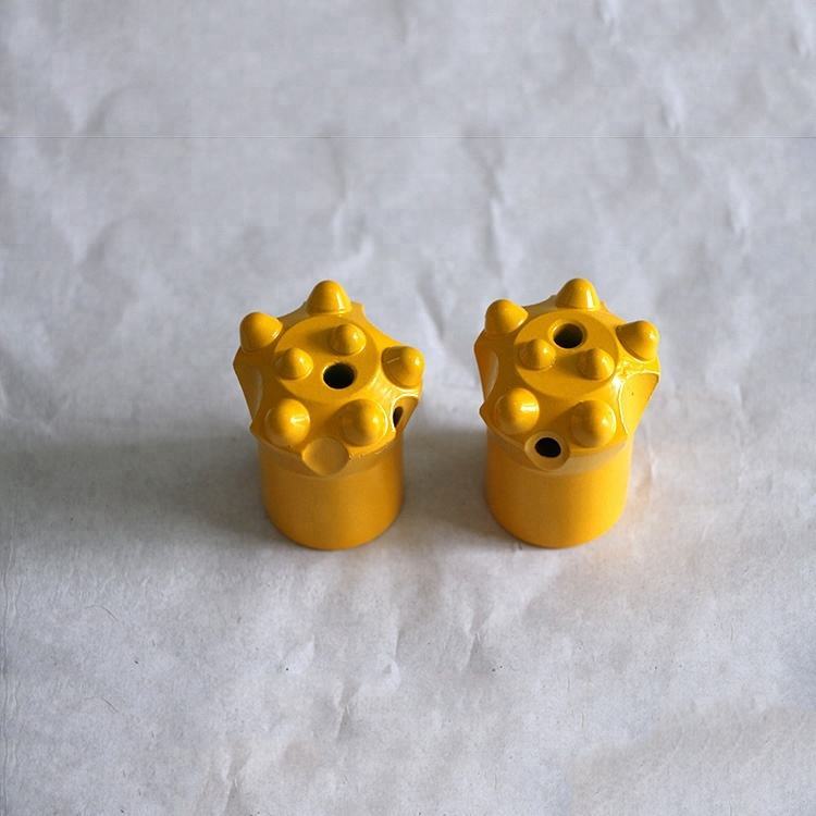 Tapered button bit