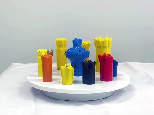 What are the uses of top hammer drills