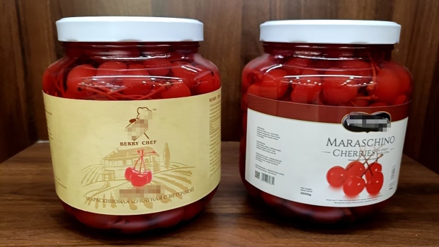 Cherry in syrup in jar