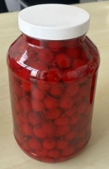 Cherry in syrup in jar