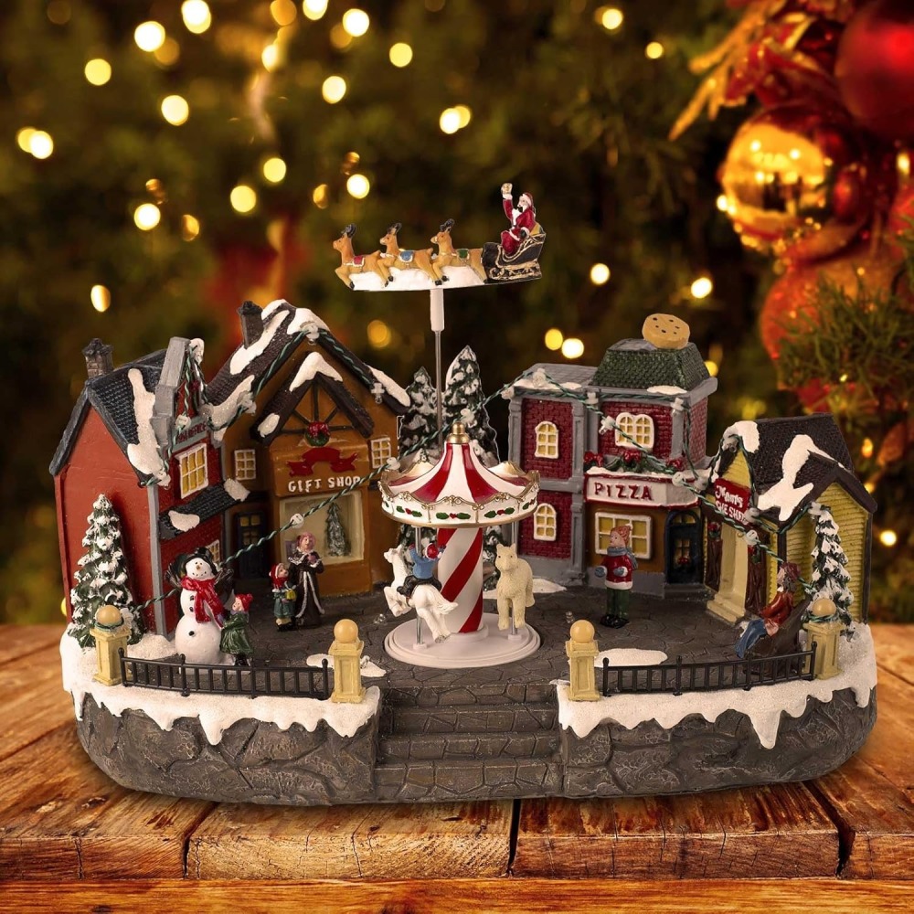 Animated Christmas Village Scene with Santa Sleigh, LED Lights & Rotating Carousel, Musical Holiday Town Square House Building with Figurines and Shops - Indoor USB Tabletop Christmas Display