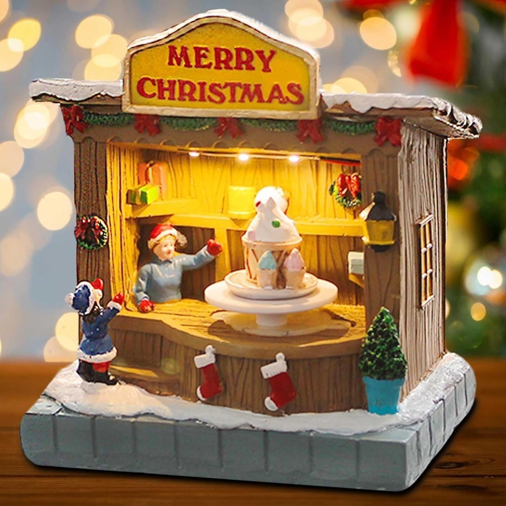 Wholesale innodept12 LED Christmas ice cream shop featuring a "Merry Christmas" sign, rotating dessert display, and festive figures.