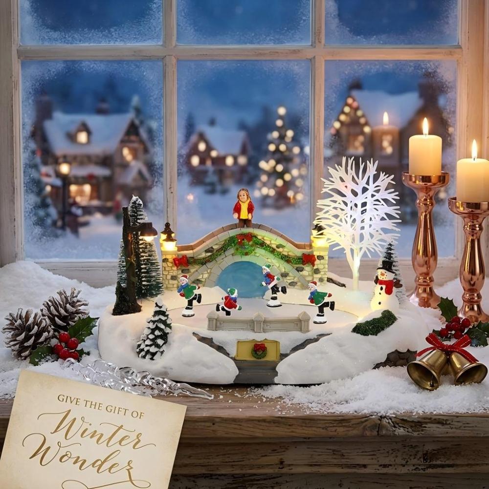 Festive Christmas village ice skating rink display with rotating skaters on a warm windowsill with holiday decorations.