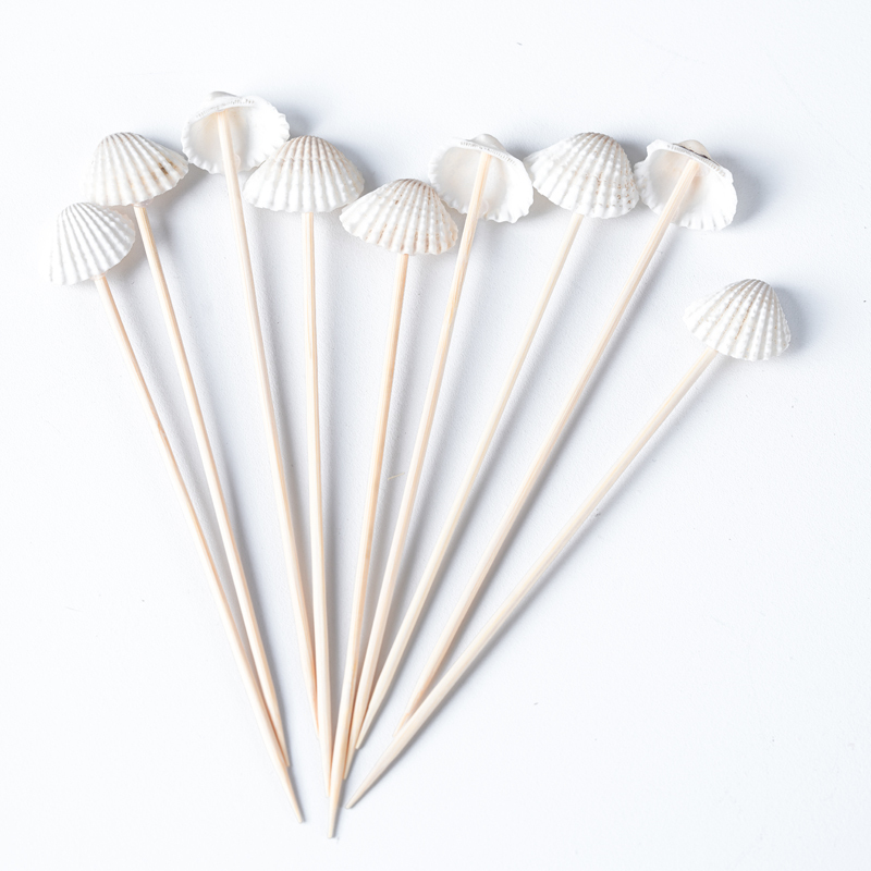Each pack contains 100 white shell bamboo sticks and 4.7-inch disposable fruit sticks for a summer beach party