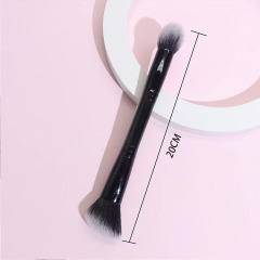 Black double-ended brush