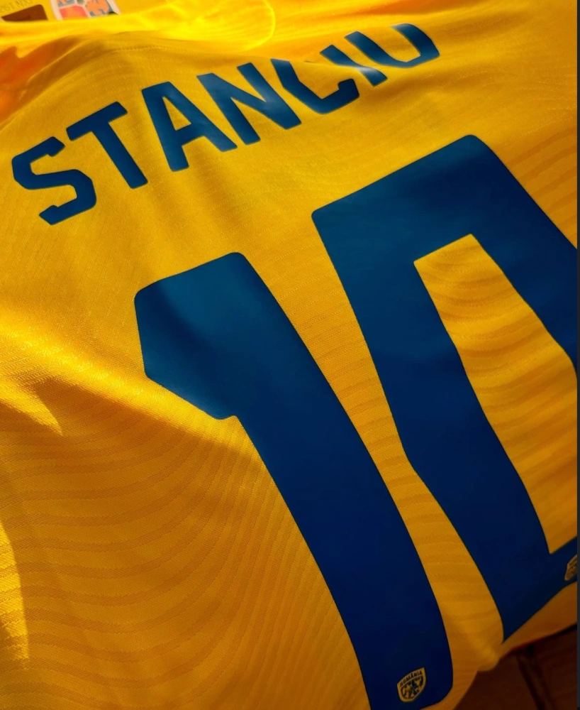 Romania's home football jersey for 2025-26 Player version