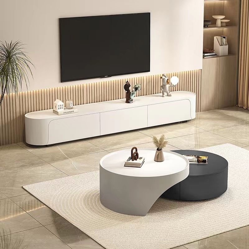 Modern minimalist living room: baked paint technology TV cabinet and artistic coffee table