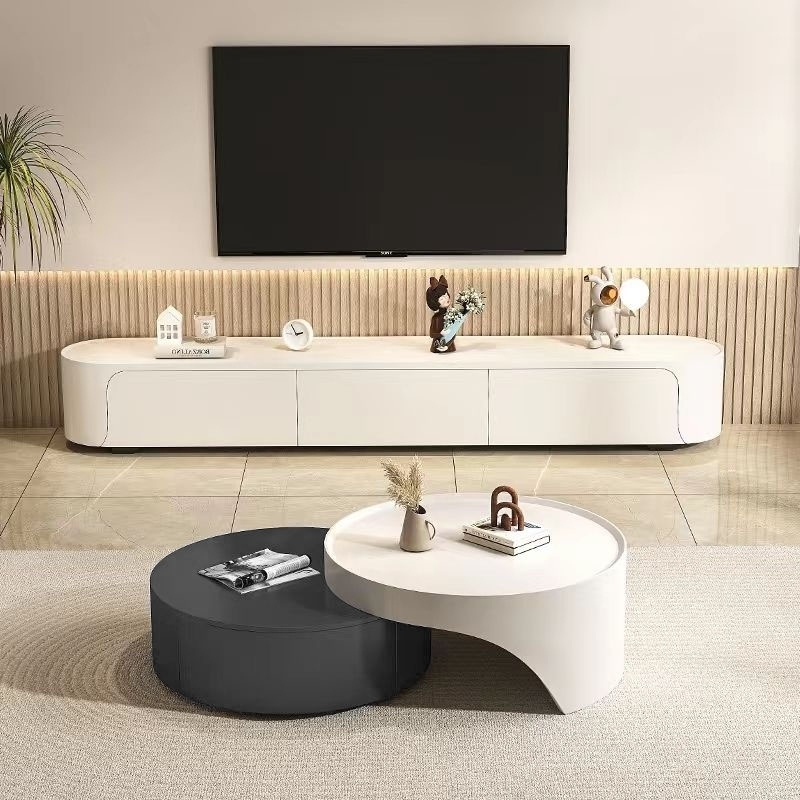 Modern minimalist living room: baked paint technology TV cabinet and artistic coffee table