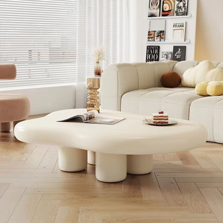 Cloud shaped creamy coffee table injects a healing and relaxing feeling into the living room