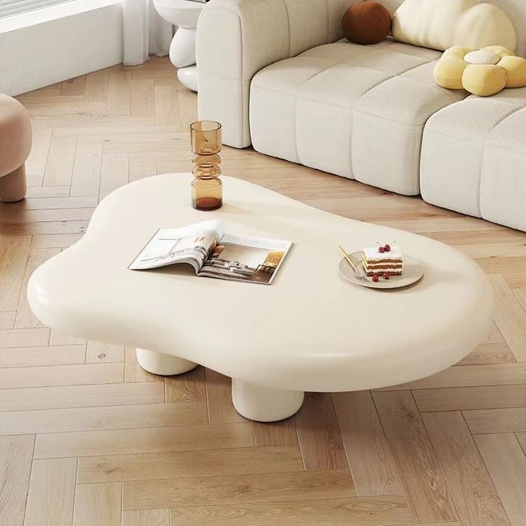 Cloud shaped creamy coffee table injects a healing and relaxing feeling into the living room