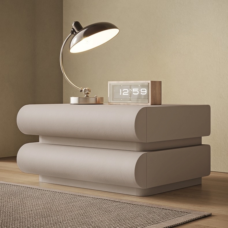 Italian minimalist cream style bedside table, rounded curves and leather texture create a warm bedroom atmosphere