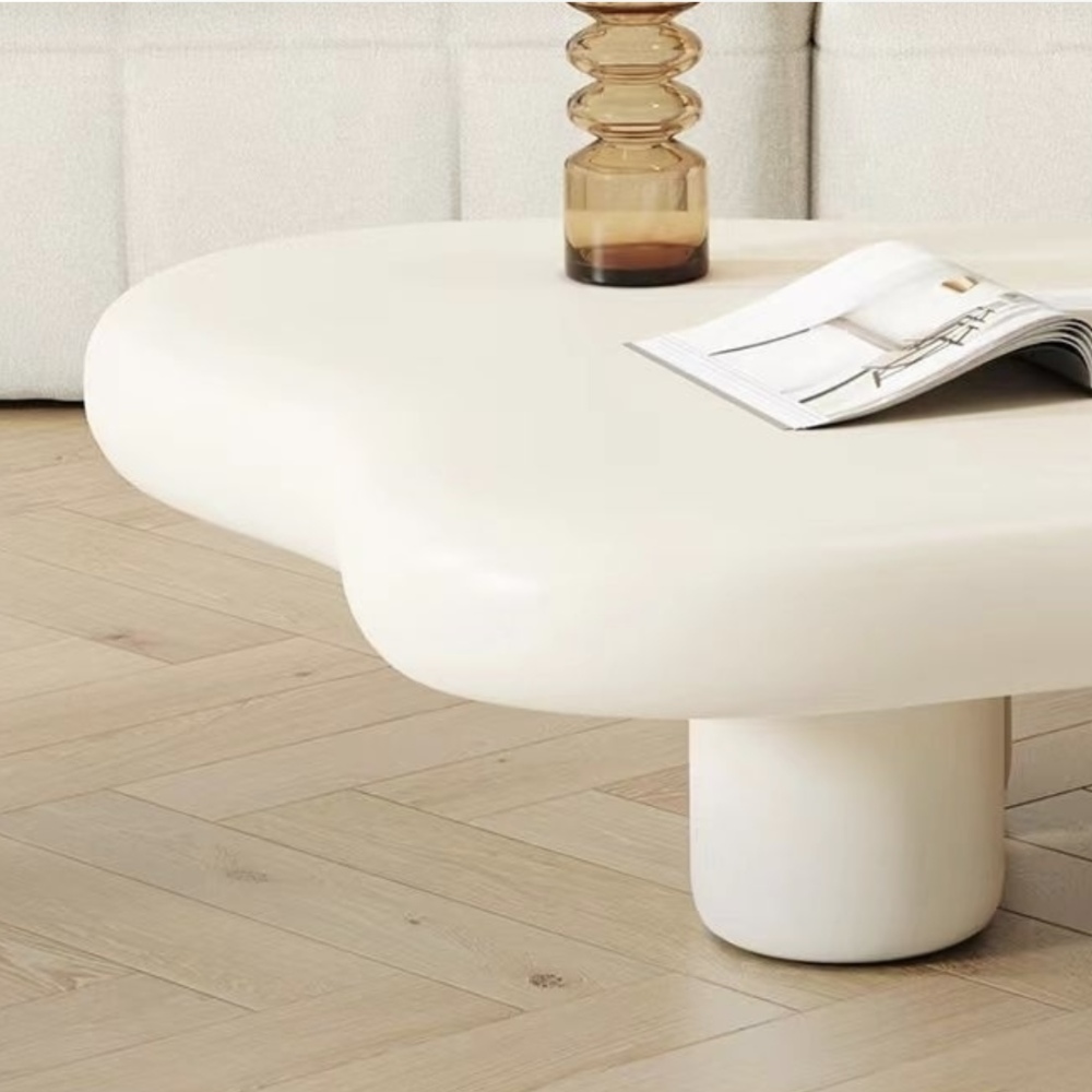 Cloud shaped creamy coffee table injects a healing and relaxing feeling into the living room