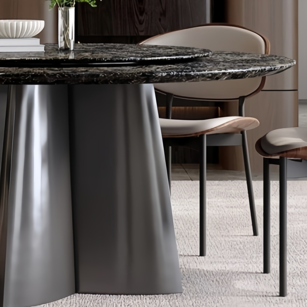 Circular countertop and black columnar base: the structural aesthetics of luxury stone dining tables