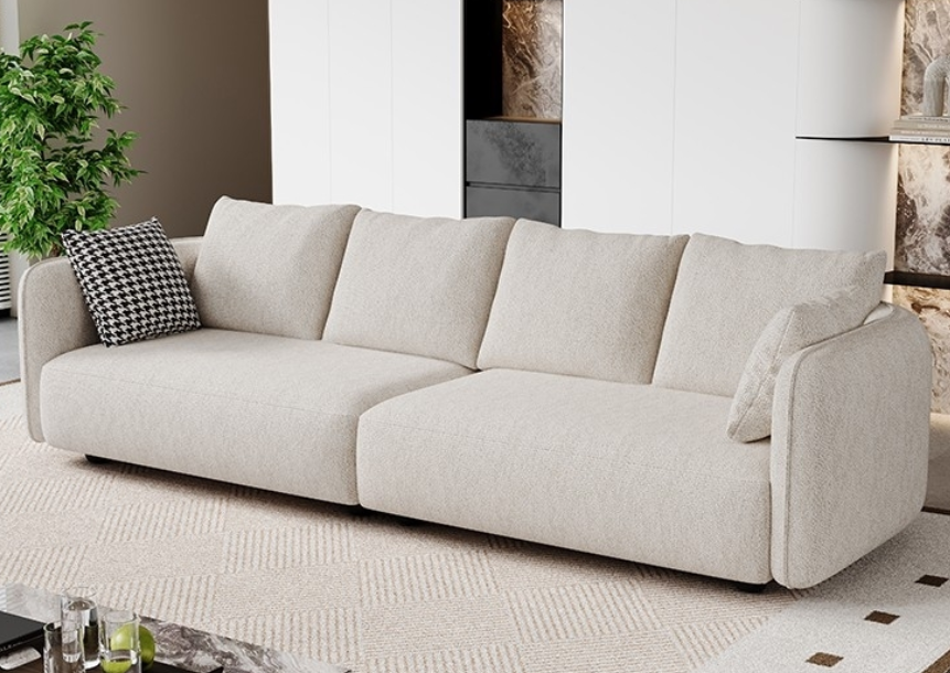 Modern minimalist living room: fabric sofa and artistic decoration