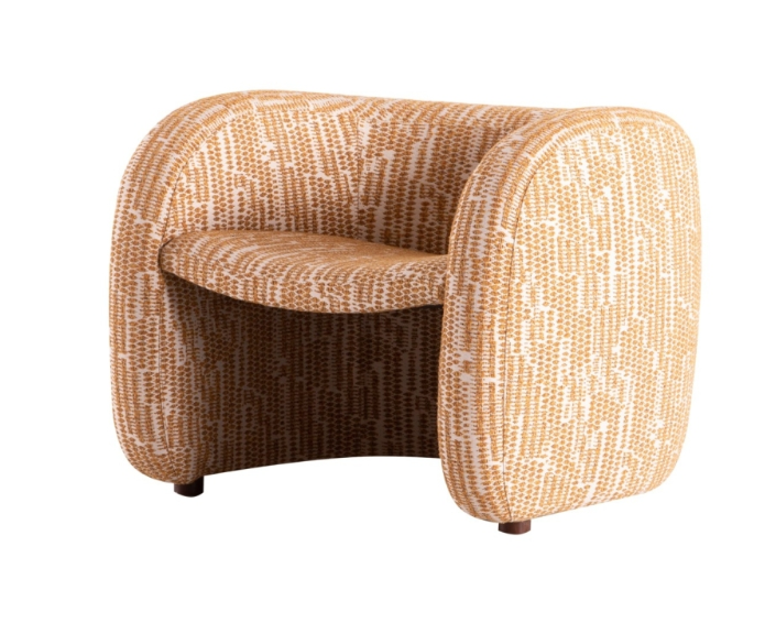 Fabric soft armchair: a home item that combines comfort and aesthetics