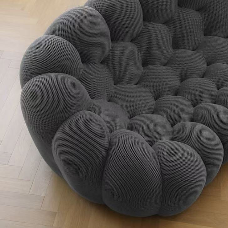 Italian minimalist football sofa: a lazy space outlined by curved lines