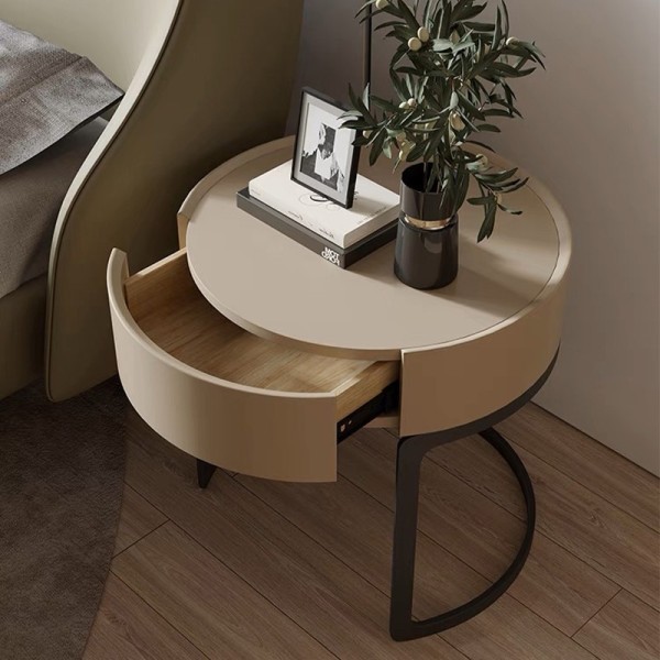 Light gray curved bedside table: a gentle embellishment of minimalist space