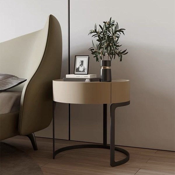 Light gray curved bedside table: a gentle embellishment of minimalist space