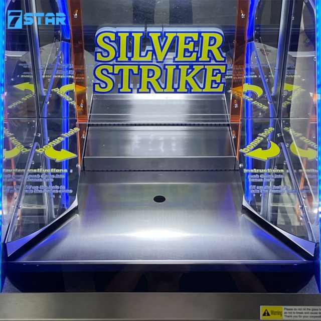 coin quarter pusher machine bonus hole