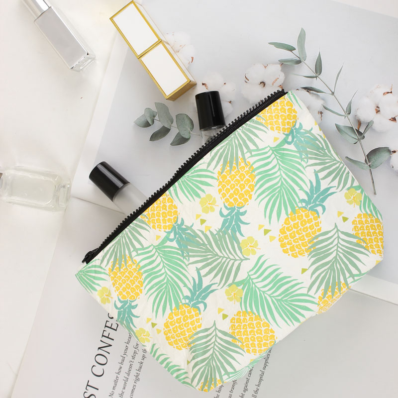 Printed Tyvek travel cosmetic pouch used as an artwork coverage reference