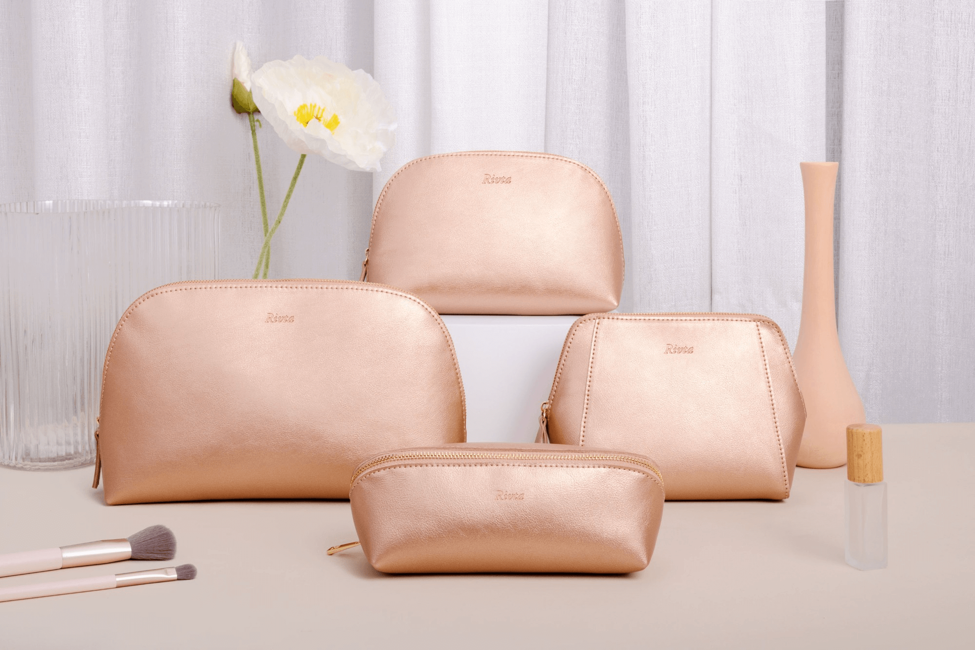 A collection of custom makeup bags with different materials and logos