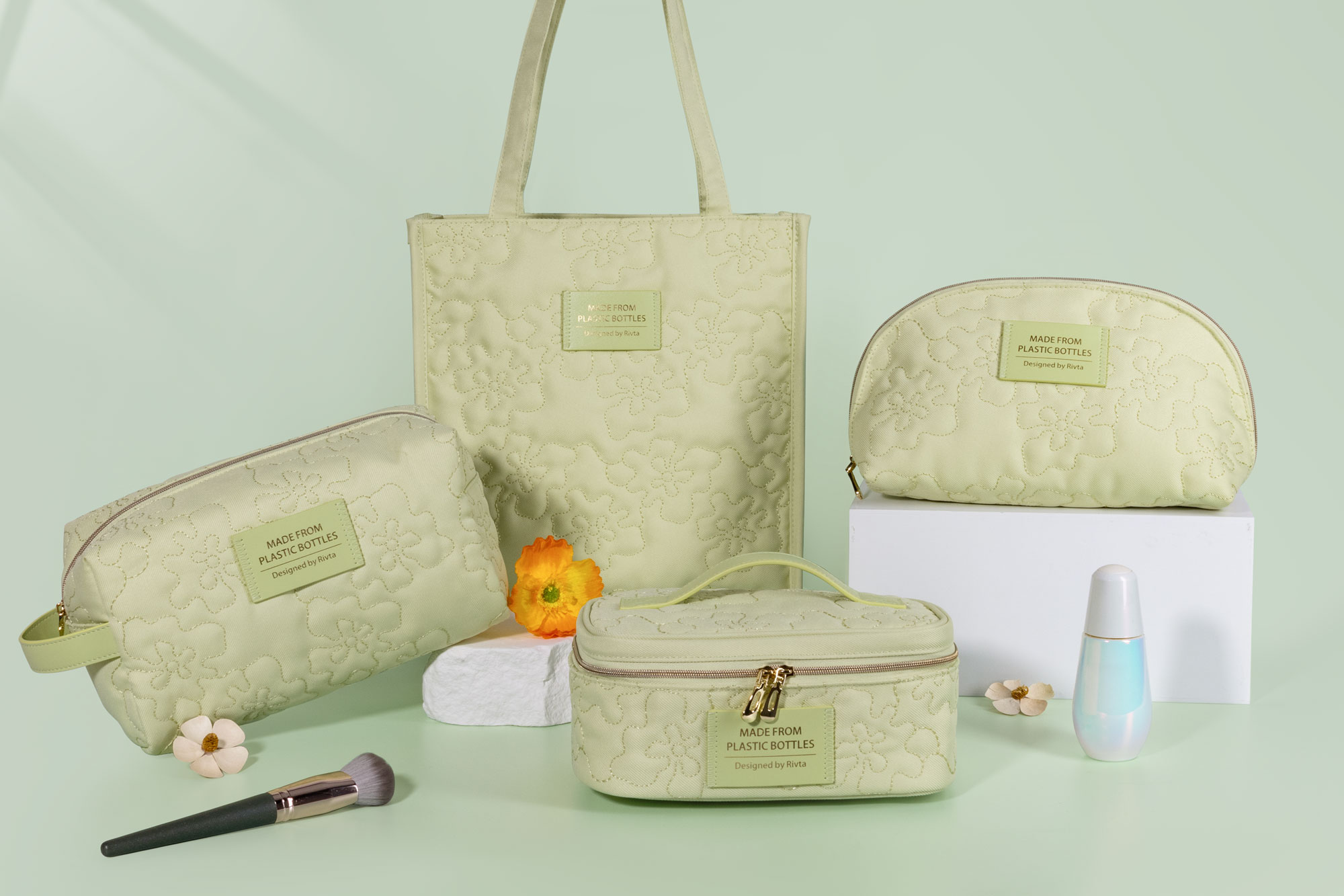 A collection of trendy cosmetic bags in boxy, stand-up, and barrel shapes