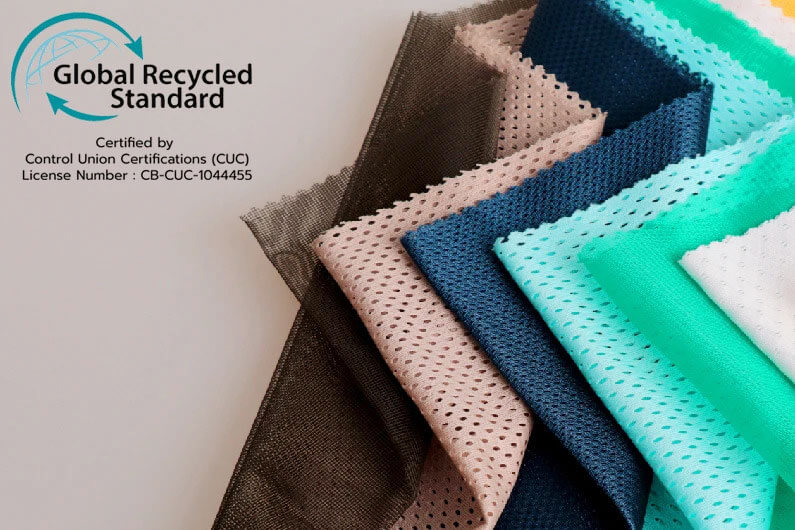 A display of innovative recycled and plant-based fabric swatches for cosmetic bags