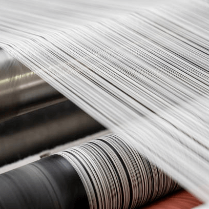 High-quality yarn is woven into durable versatile RPET fabric  ready for production