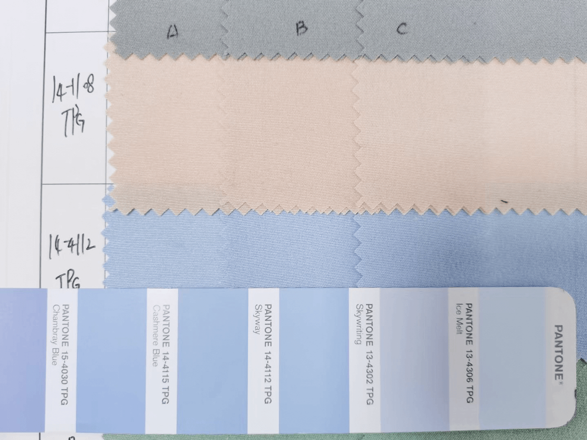 Pantone color chips matched with custom dyed fabric swatches