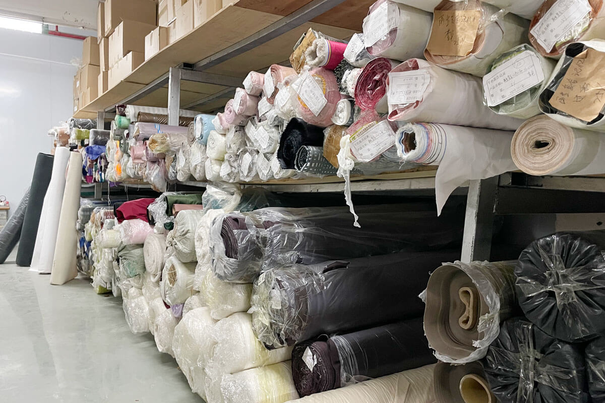 Rivta warehouse stocked with rolls of eco-friendly fabrics ready for production