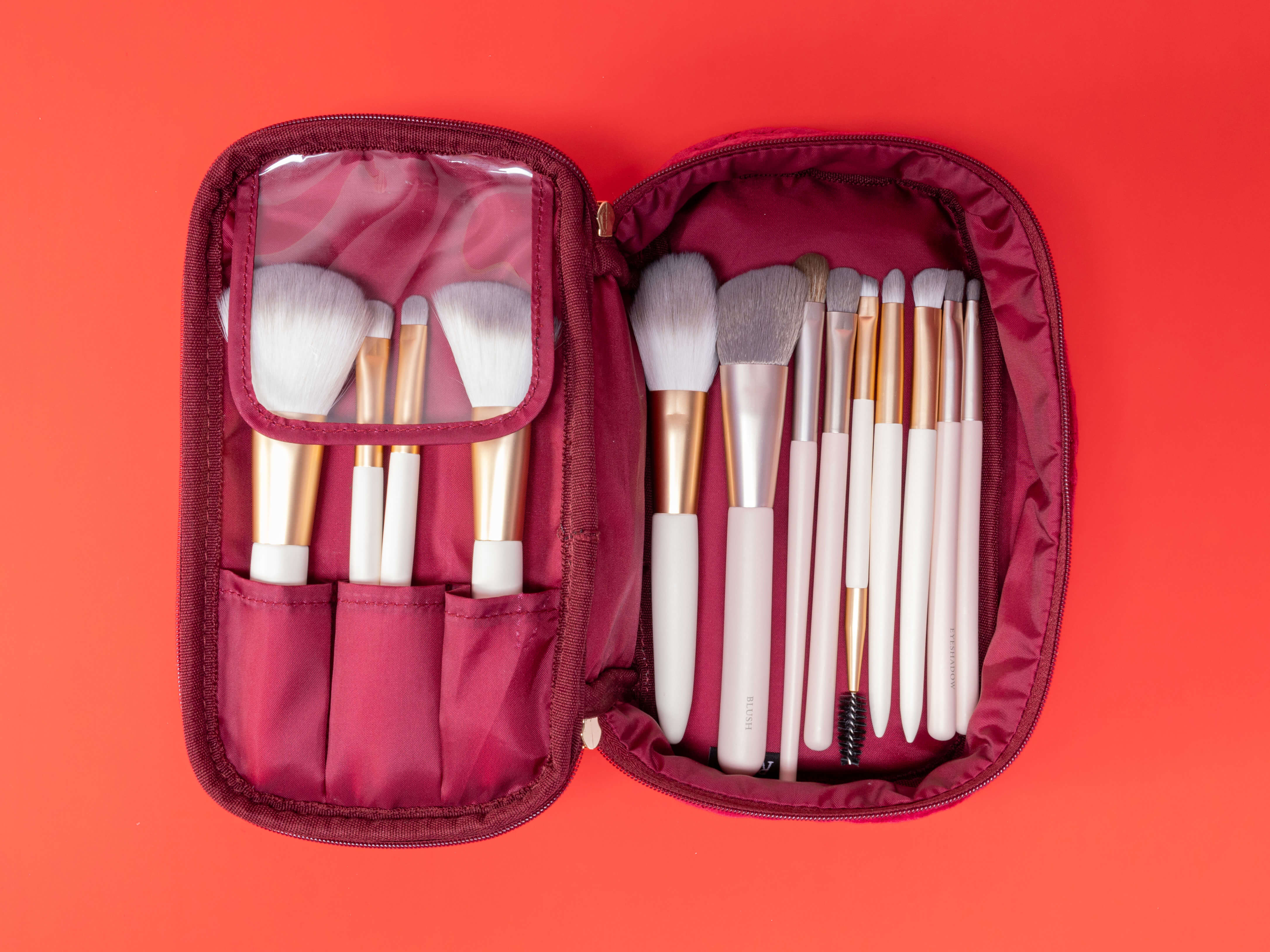 Interior of cosmetic bag with brush compartments and wipeable lining