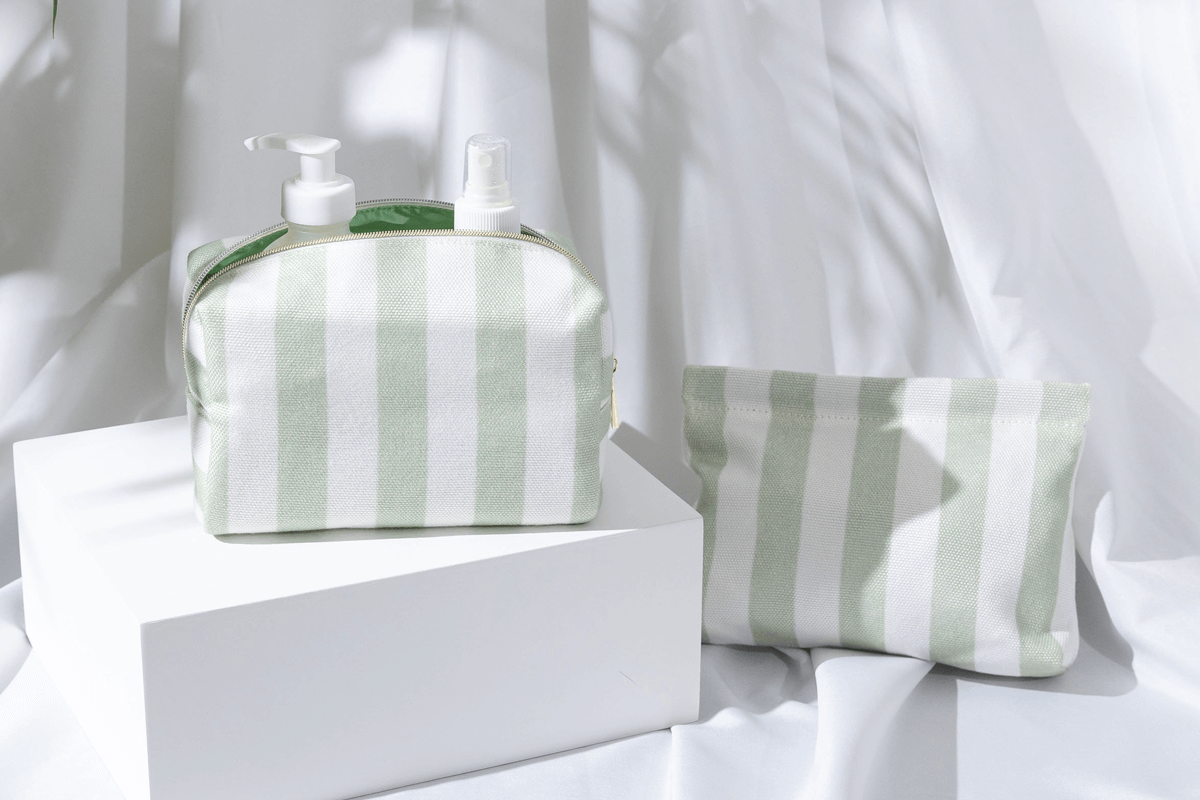 A stack of soft, pastel-colored bamboo fiber pouches, looking silky and draped.