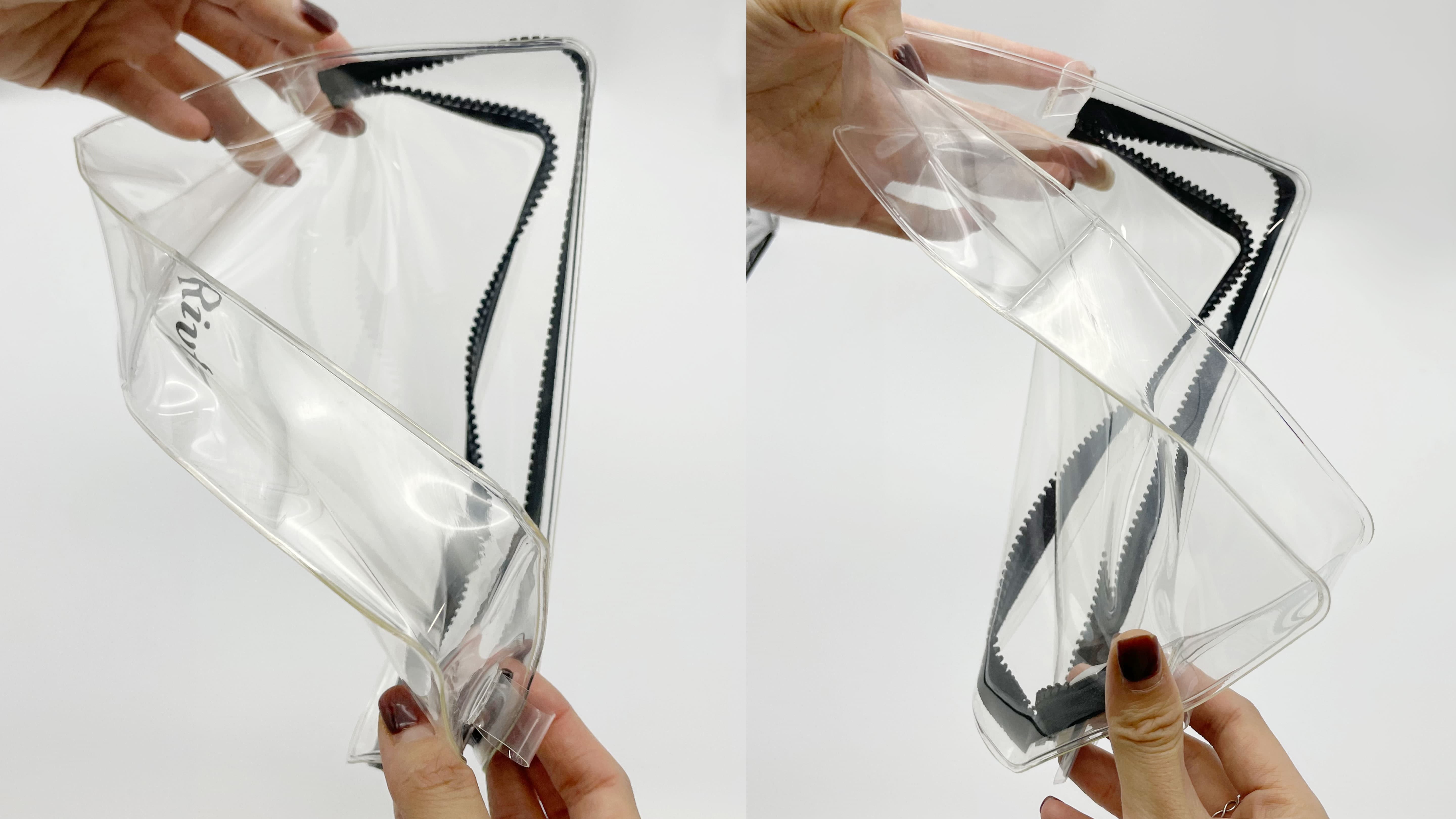 Image showing a flexible, transparent TPU makeup bag being twisted to show durability, confirming it doesn't crack like PVC.