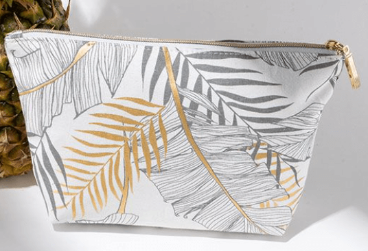Leaf print cosmetic pouch with zipper and trim
