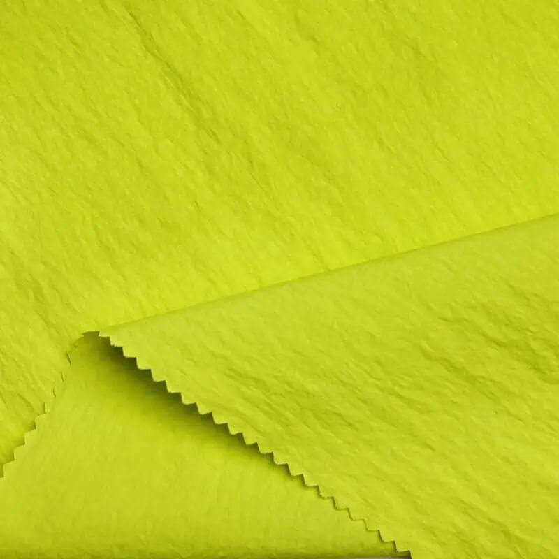 Recycled nylon material swatch for cosmetic bag sourcing