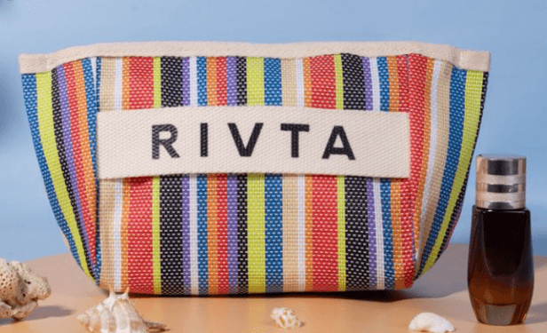 Striped full-print cosmetic bag with woven label