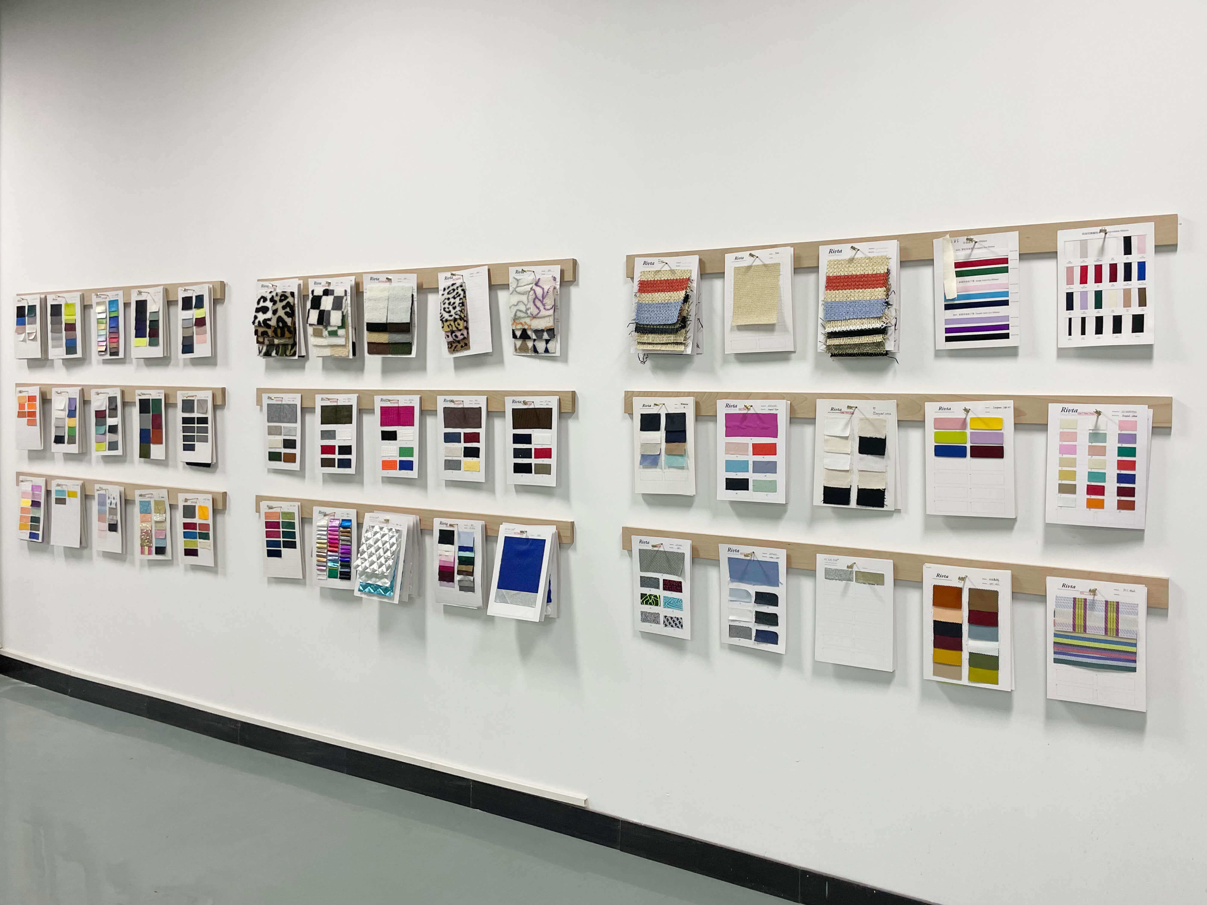 Rivta material color swatch library for comparing RPET and virgin polyester cosmetic bags