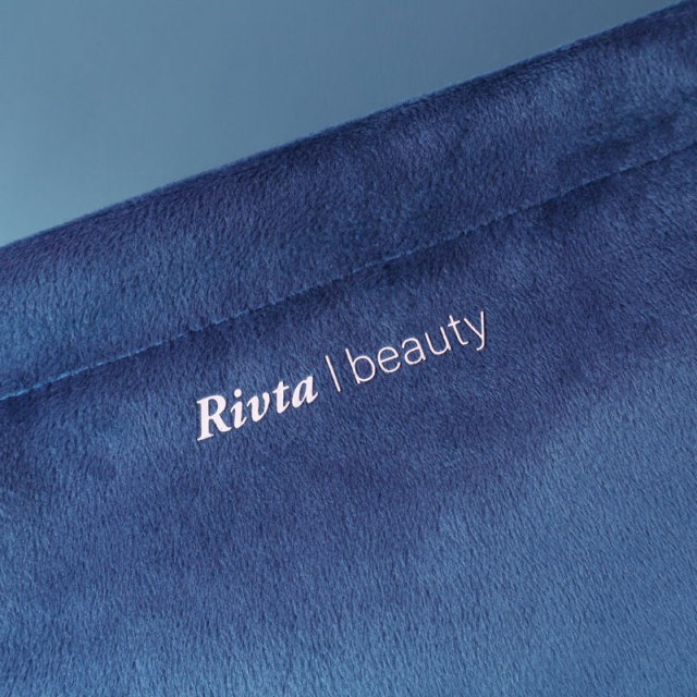 Logo scale detail on velvet pouch for airline cosmetic pouch sampling