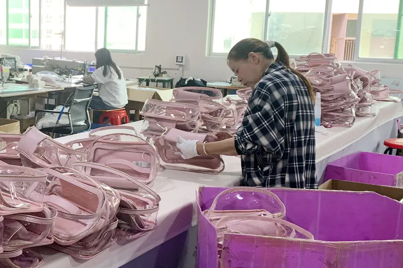 QC dimension and sewing check for a cosmetic bag at Rivta Dongguan factory