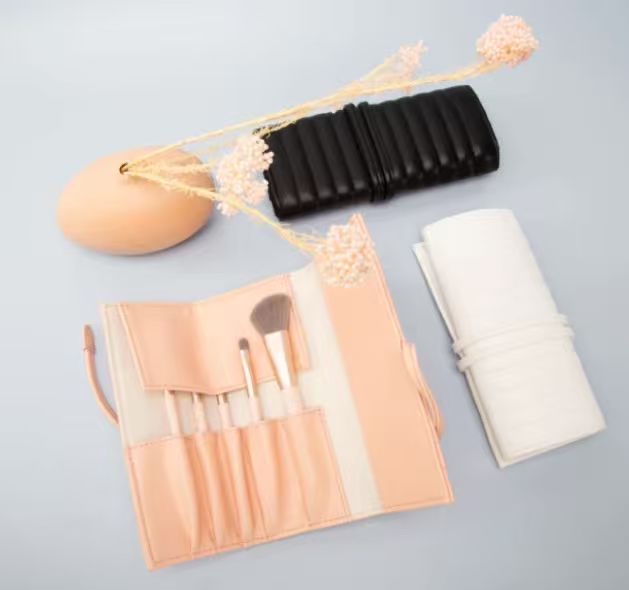 Custom makeup brush roll samples used to review size, slots and protective flap